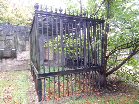 19th century grave.  Either they didn't want grave robbers getting in, or the dead getting out.  You decide.  I think the latter is the better story.