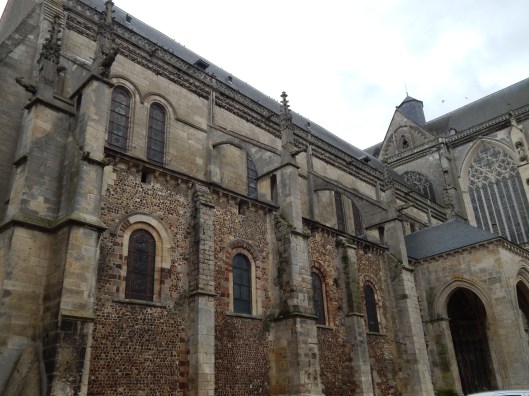 Romanesque nave with early Gothic buttressing added to support stone vault