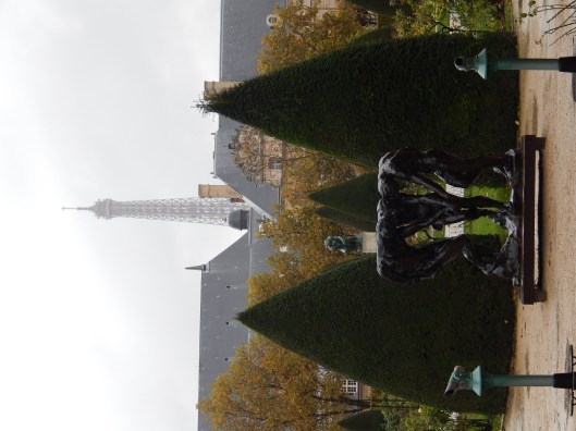 Three Shades with The Thinker and the Tower in the distance